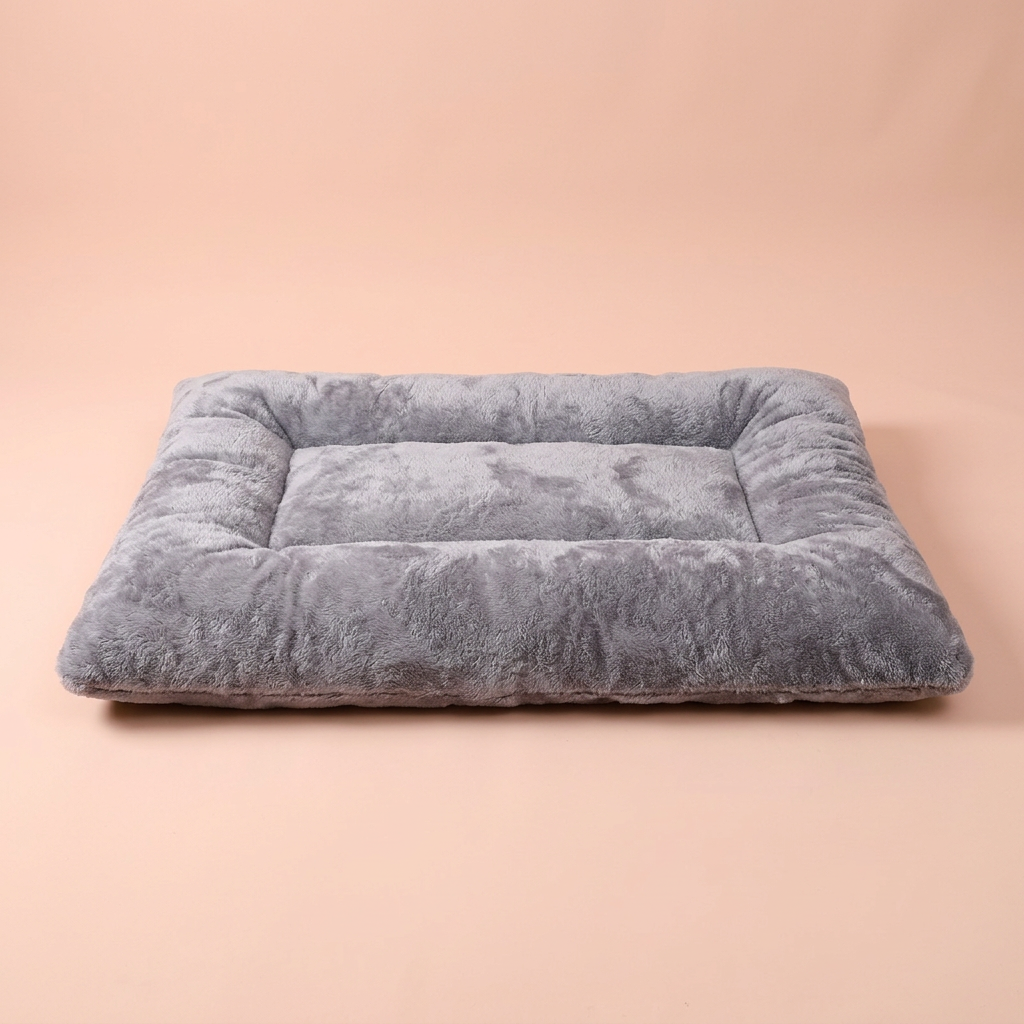 Long warm plush dog bed with quilted base
